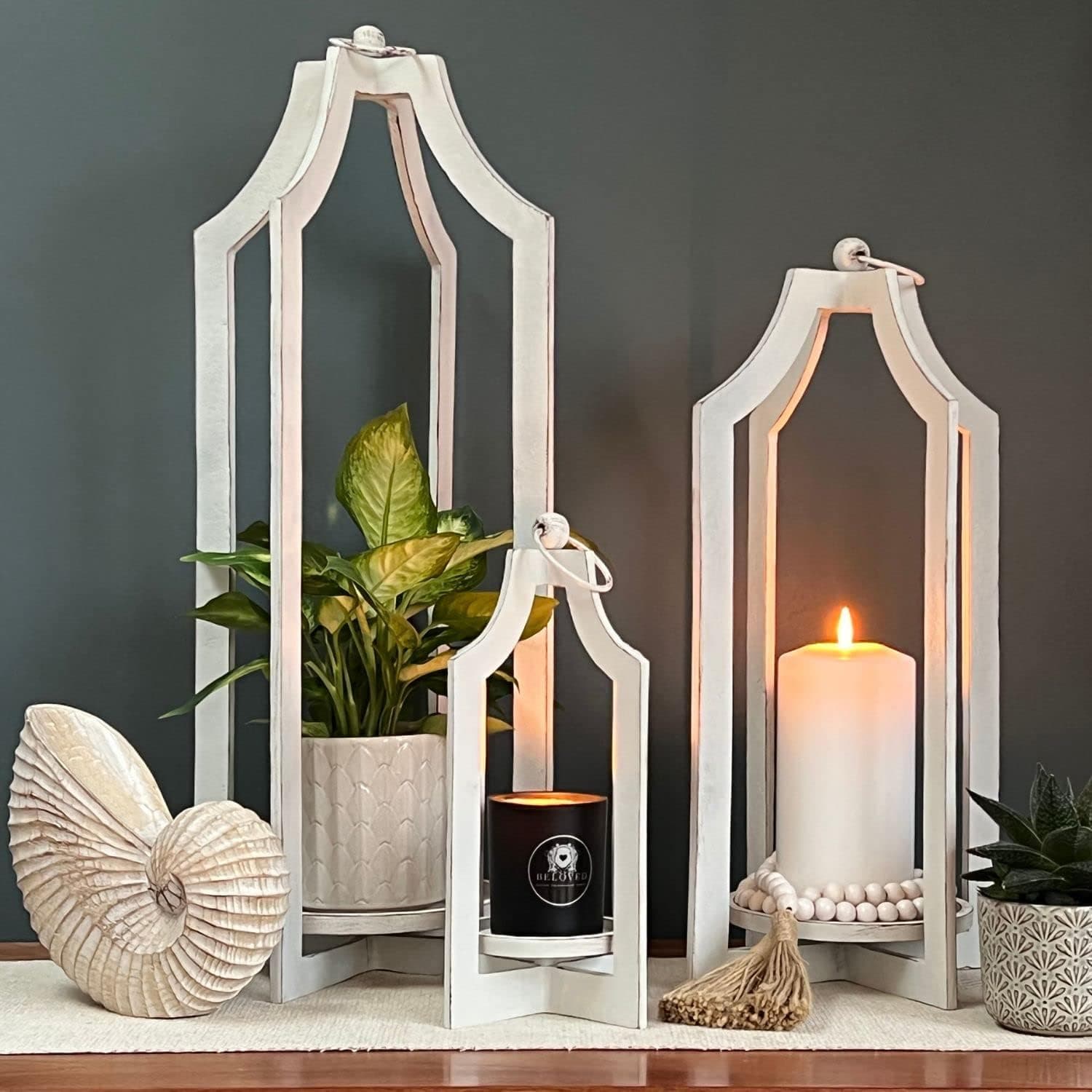 Sculptural lanterns styled in a calm interior setting